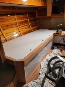 Sailboat cabin; hull ceiling and settee